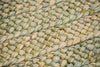 Photo close up of a woven rush mat.