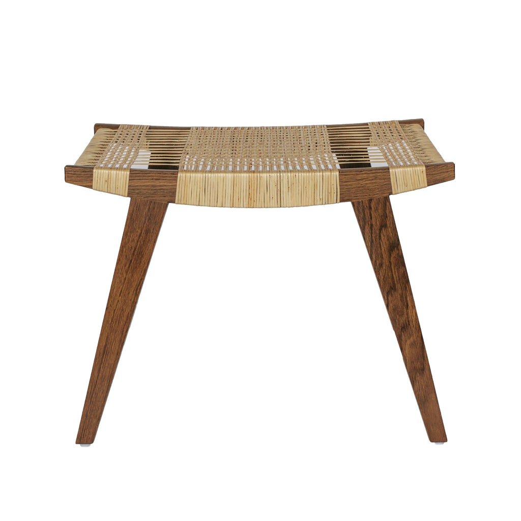 Photo of a fumed oak and split willow pi stool on a white background.