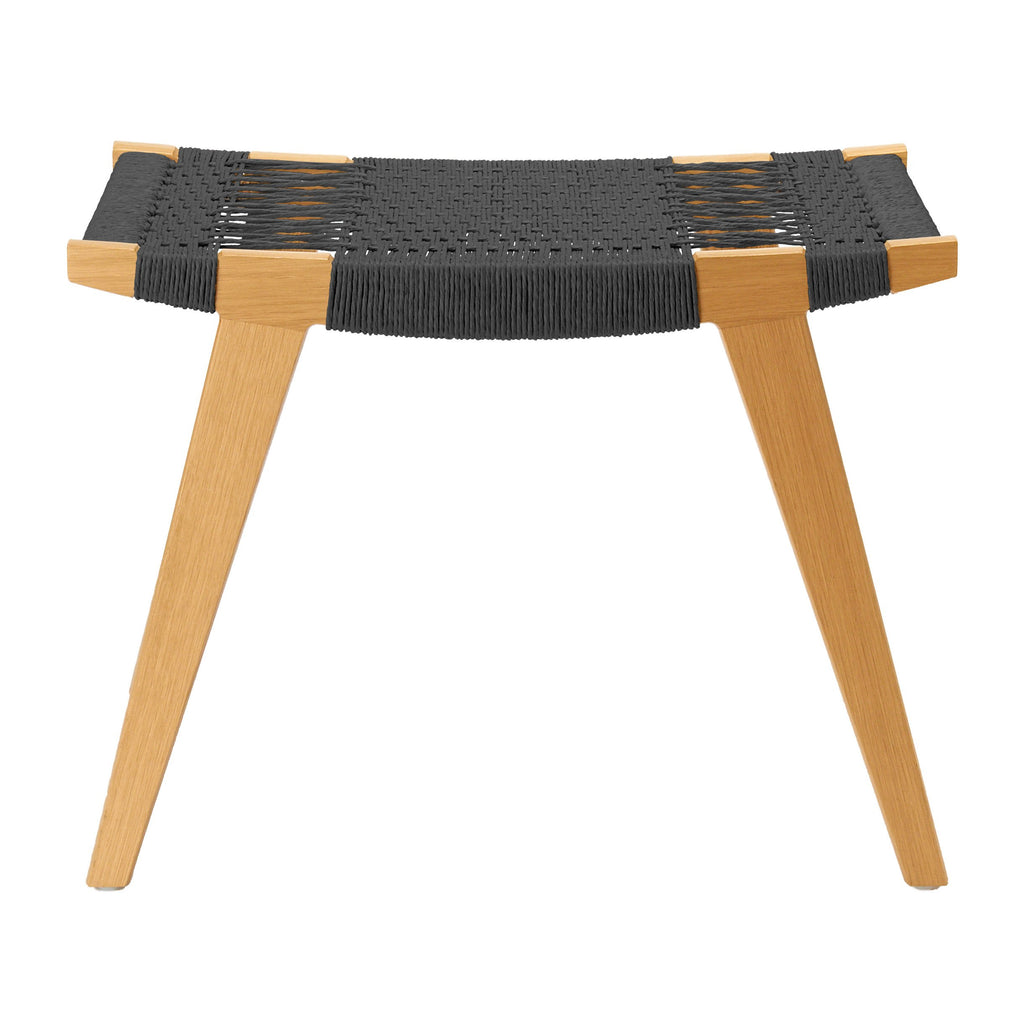 Photo of a natural oak and black Danish Cord pi stool on a white background.